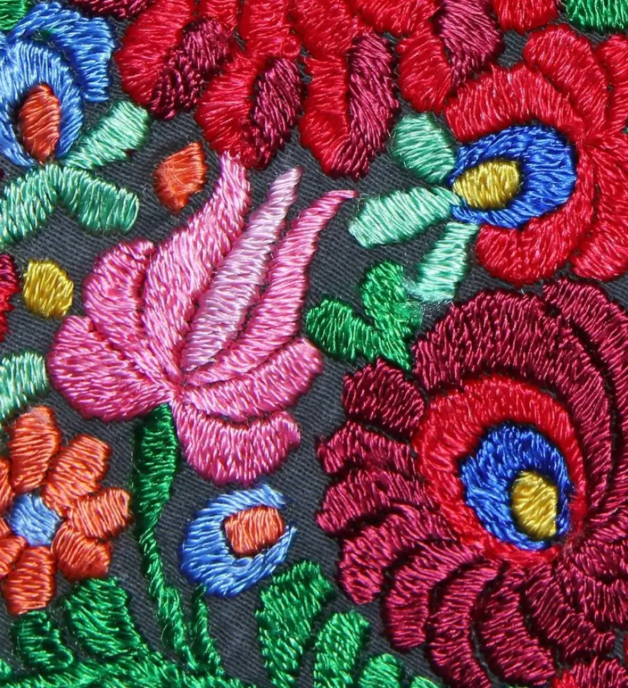 A close up of the flowers on a blanket